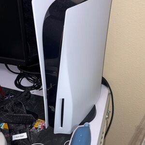 White and Black Gaming Console Ps5
